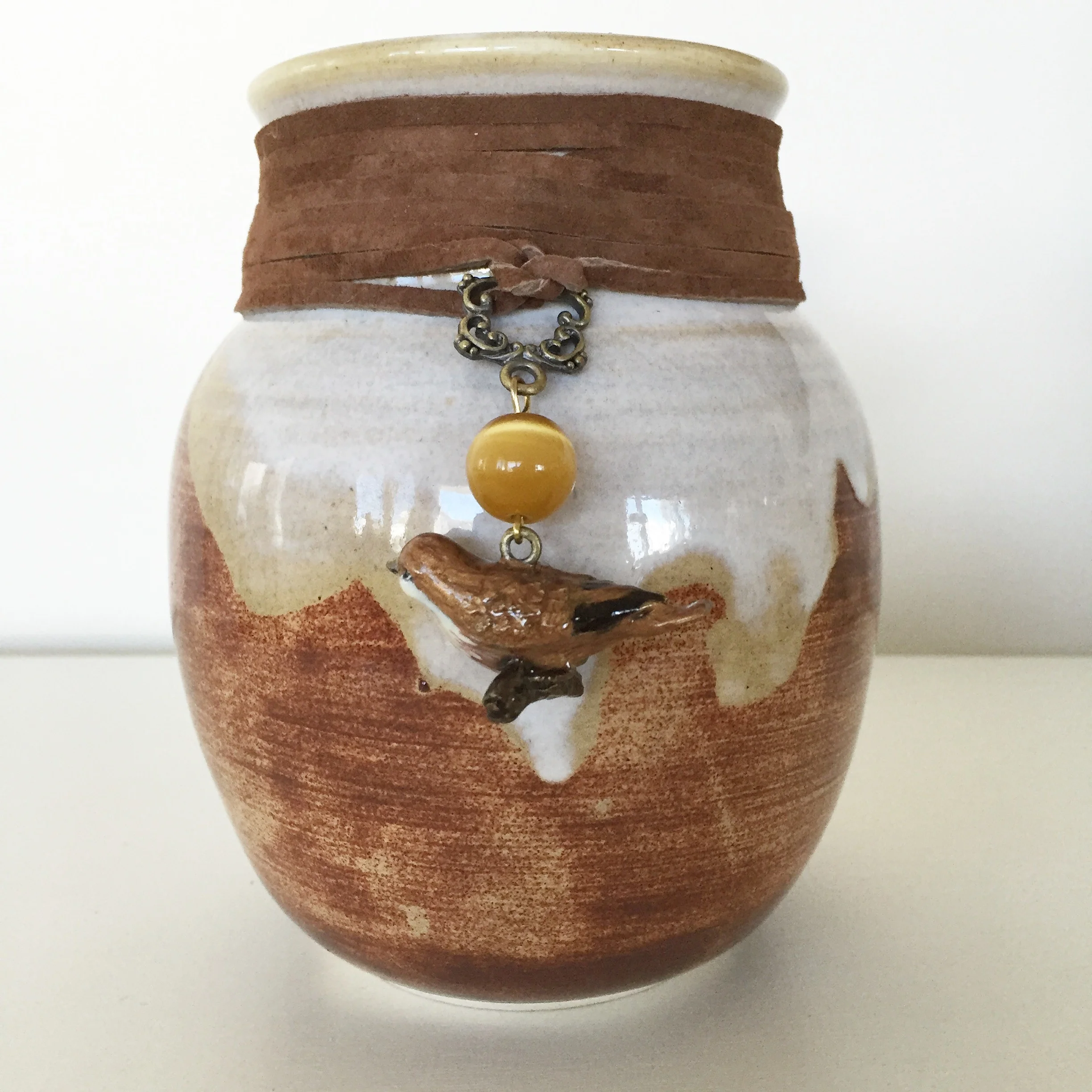 Vase with suede, bead, and bird