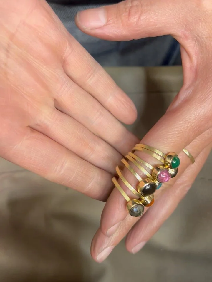 My heart melts when gemstones find their way to express themselves this beautifully. 
It all started with a solid 18k gold nugget, rolled and transformed into this fabulous 7 rings. 
I am obsessed! I want to keep them all, hehehe&hellip;
I&rsquo;m wo