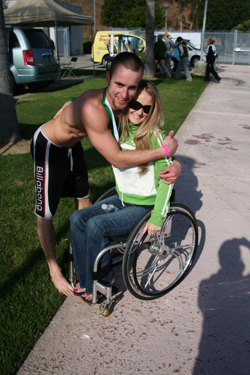 Richard and I did a triathlon together as a relay team. I did the run portion in my wheelchair and he did the bike with a hand cycle and then ended it with the swim. Anyone of you that have read my book know the story. Richard is in great shape so he thought he could do this with flying colors. Well, riding a hand cycle for 9 miles (most of it being uphill) when you have never done it before to only follow it up with a mile swim is pretty tough. The challenged athletes get to ride their hand cycles straight to the pool so they can transfer from the bike to the ground and into the pool. People were cheering like crazy for him as he approached the water. He parked the bike, stood up and dove into the pool. All of a sudden the crowds cheers faded away. I looked around to see a shocked look on faces of the spectators. It was then I realized that they thought he was handicapped. I started laughing and then cheered for him even more. He crossed the finish line, got his medal and ran over to me. He scooped me up in his arms and gave me the biggest hug while twirling me around and around. He said that never had he felt more positive energy than he did today. Every person that competed along side him was encouraging him and empowering him as he struggled riding the hand cycle. Then he asked what happened when he jumped into the pool. He noticed that it went rather quiet. I told him that the crowd thought they just witnessed a miracle.