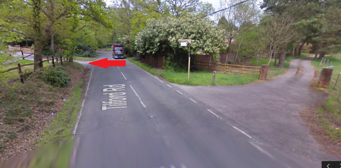 View when approaching from Tilford. You can't see the signs from this direction.