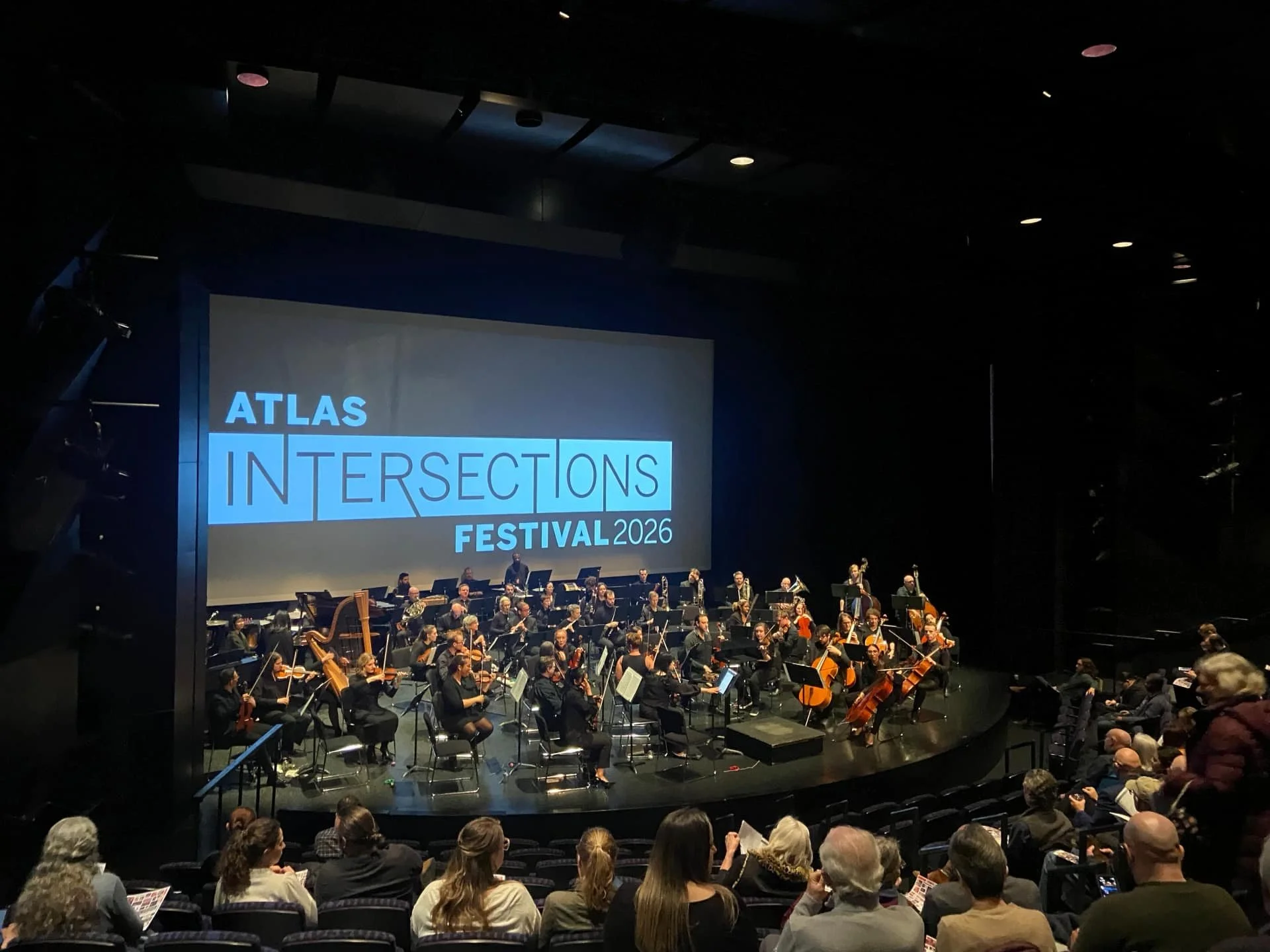 Atlas Intersections Festival 2026 audience and orchestra performance at Capital City Symphony