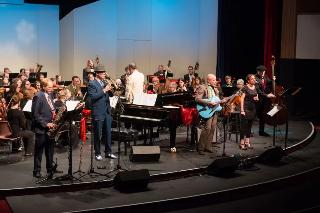 Chaise Lounge performs with a symphony orchestra.