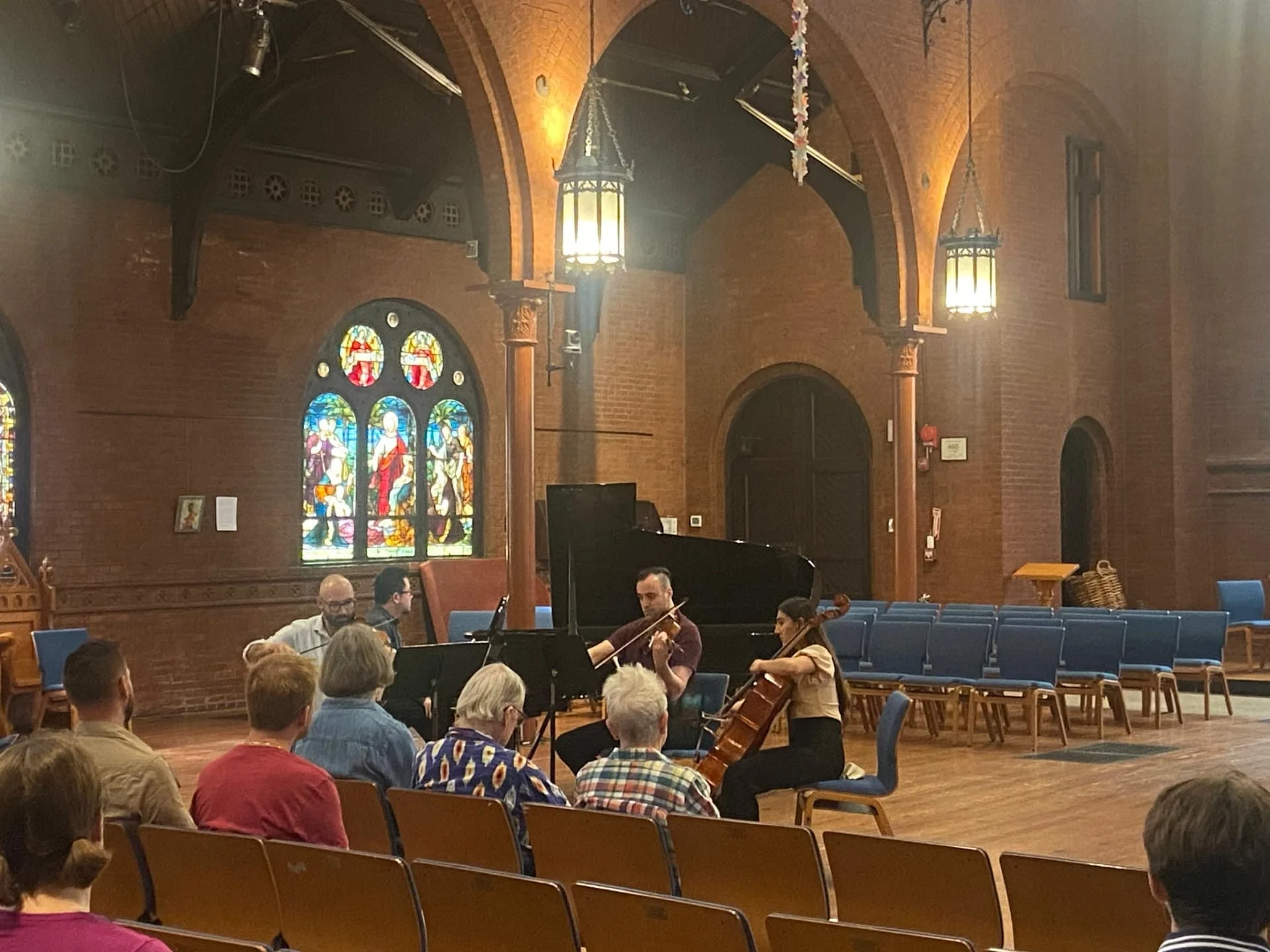 Audience gathered for a CCS Creates chamber music performance at St. Mark's Episcopal Church