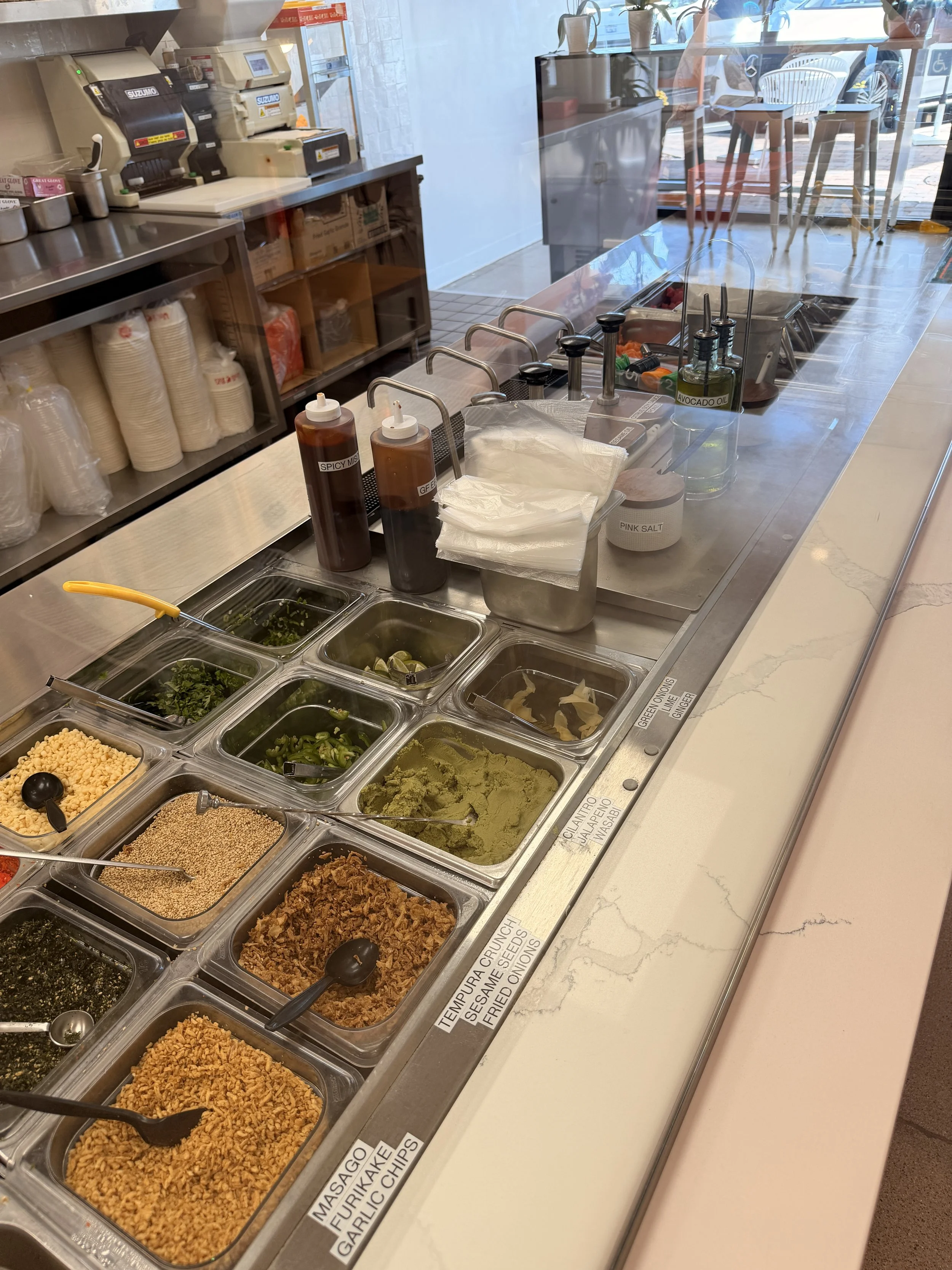 Uroko Poke Newport Beach Sauce Toppings Poke Bowl.JPG