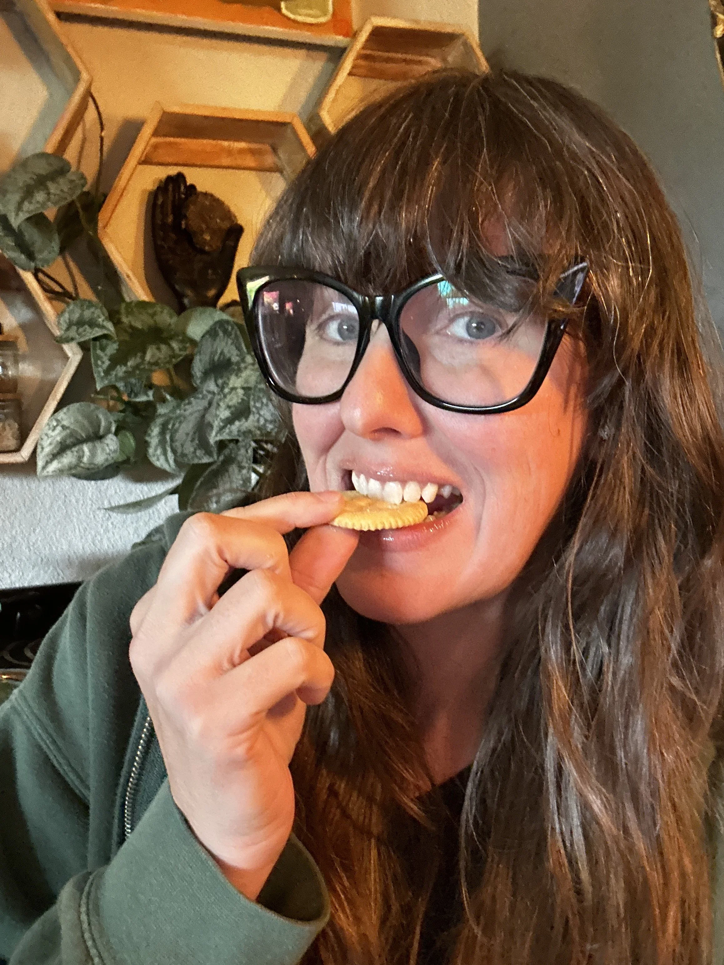 Sarai Eats a Ritz Cracker as a way to enjoy the good life.