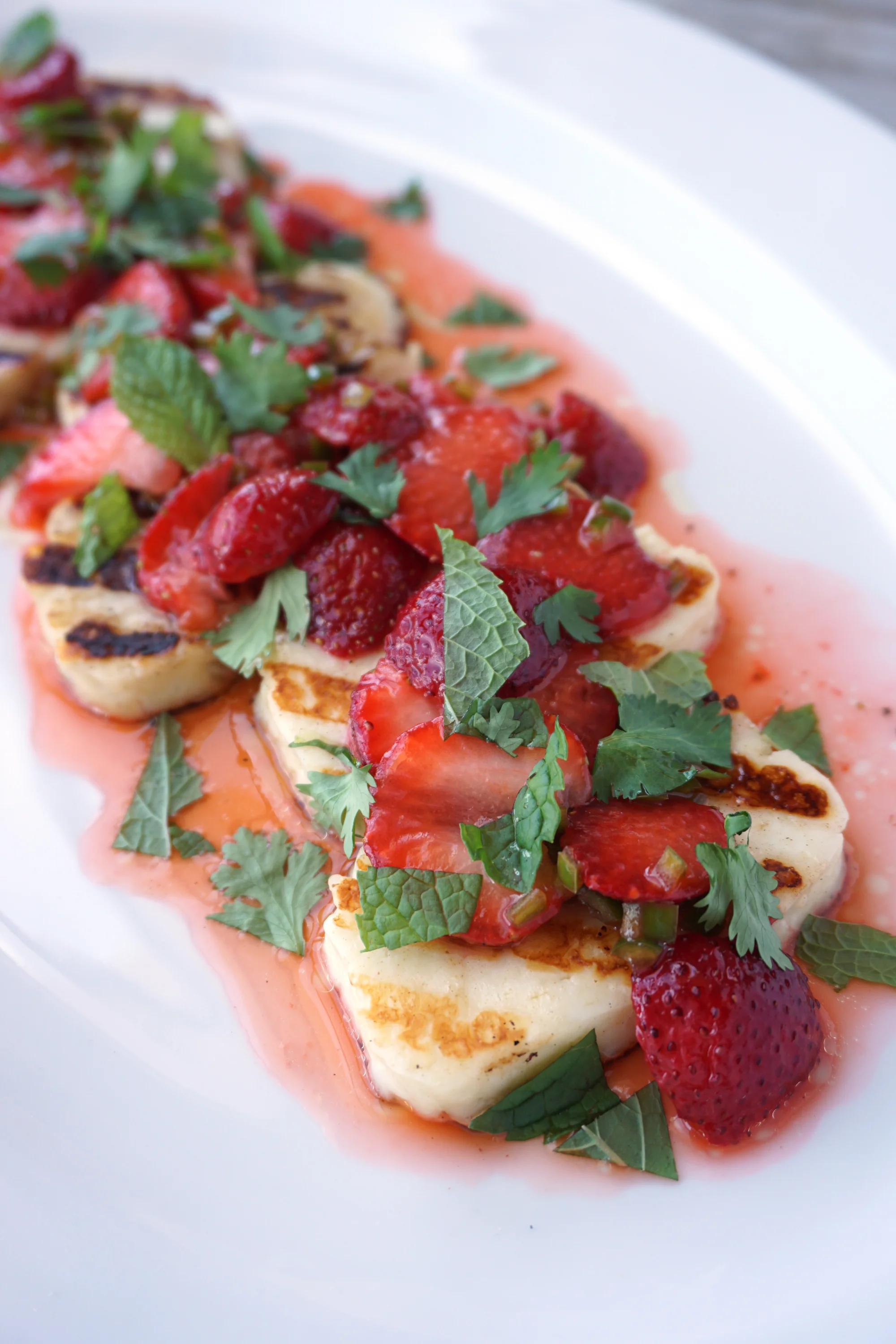 Warm, grilled Halloumi cheese with Herbed Strawberries