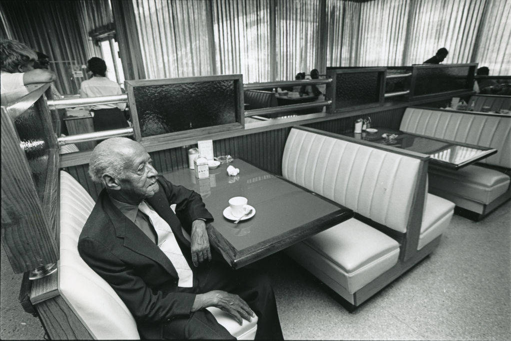 Gilmer Paschal in Paschal's Restaurant. Photograph by Andy Sharp. Atlanta Journal-Constitution Photographic Archives. Special Collections and Archives, Georgia State University Library.