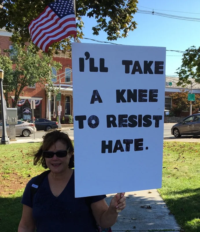 Ann Pompelio knee to resist hate.2.jpg