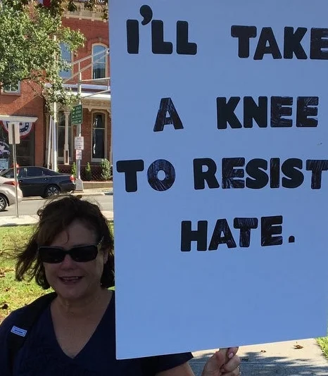 Ann Pompelio knee to resist hate.2 (1).jpg
