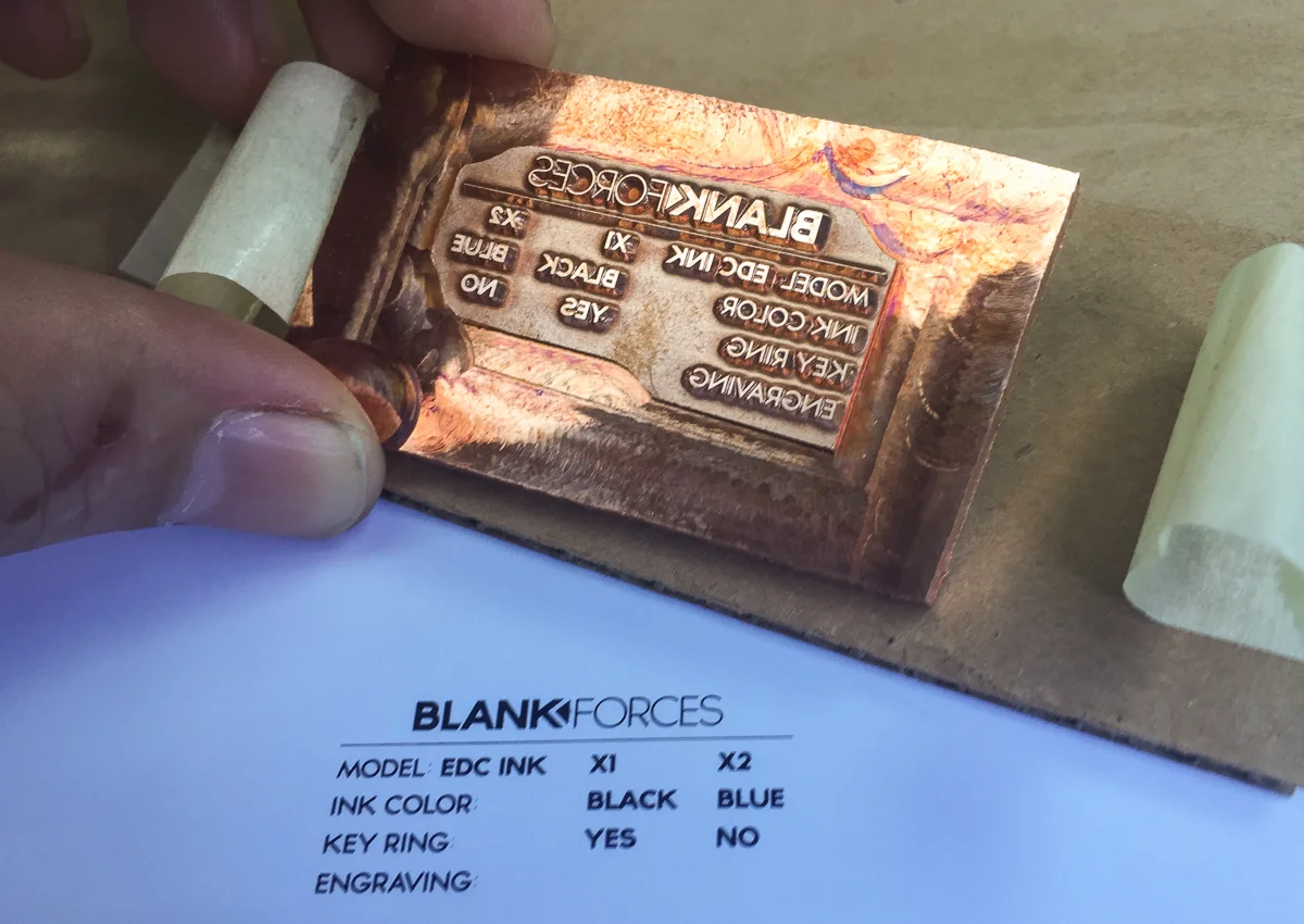 The copper plate used for the foil stamping of the EDC Ink packaging.
