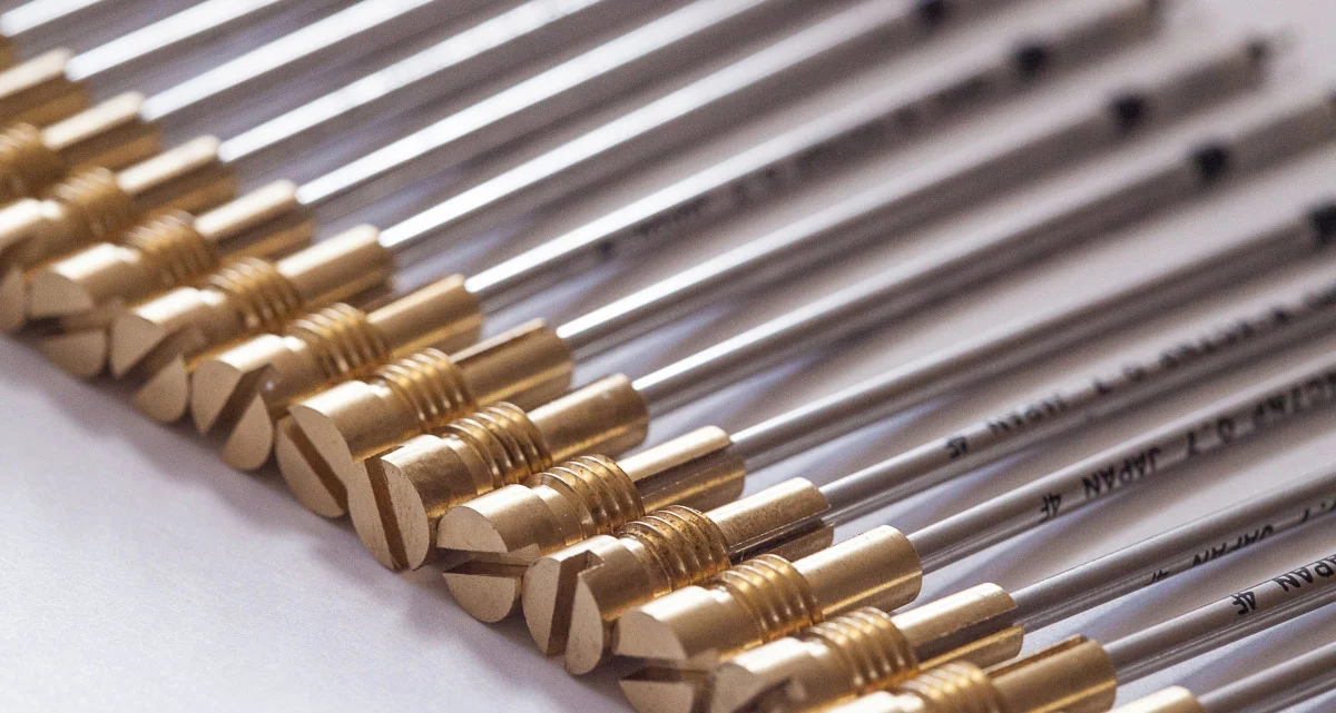 Closeup of the EDC Ink X1 retention screws holding the OHTO ink refills and ready for assembly.