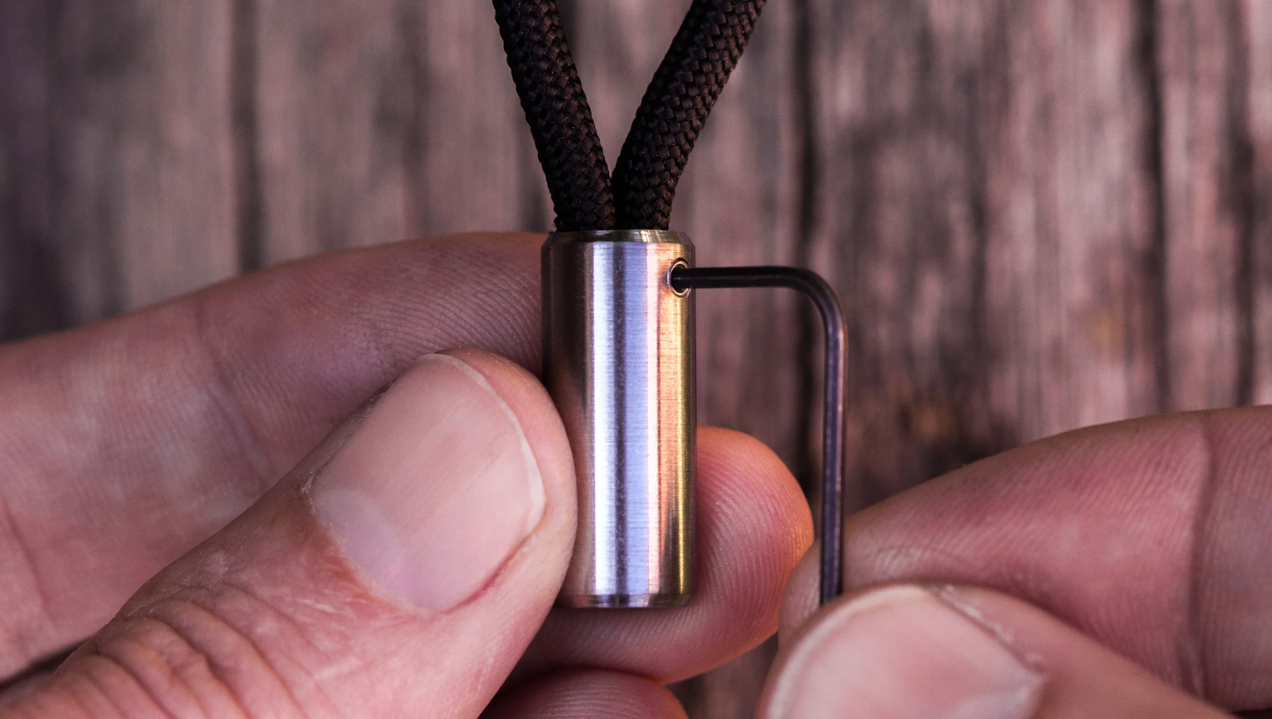 How the Cord Locks work - shown with the allen wrench used to lock in the 550 paracord.