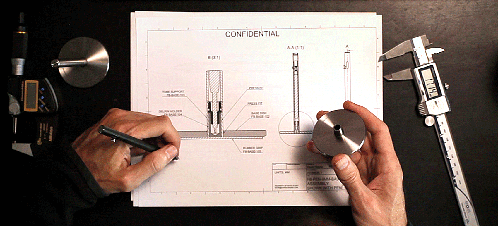 Mechanical drawing of the Injector dock with the finished dock held in my hand.