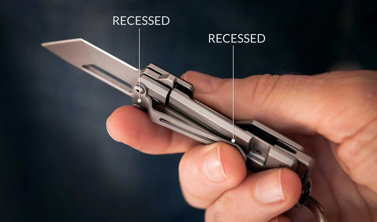 Detail of the Pocket Tanto's clip, showing how it is recessed to allow the knife to be held comfortably.