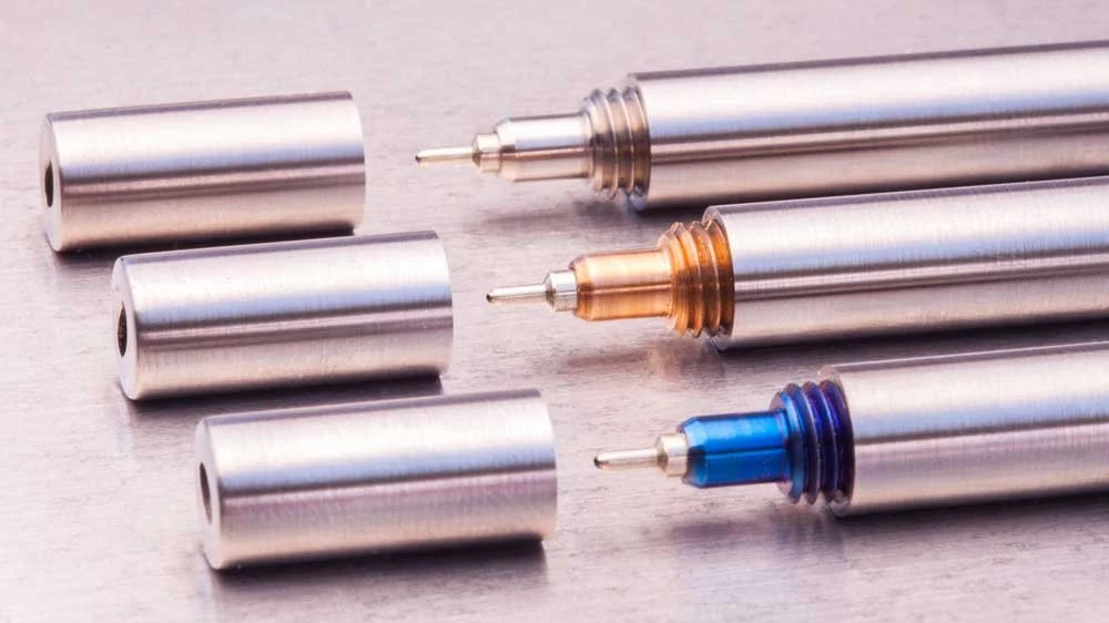 Blank Forces seamless keychain pen held in hands