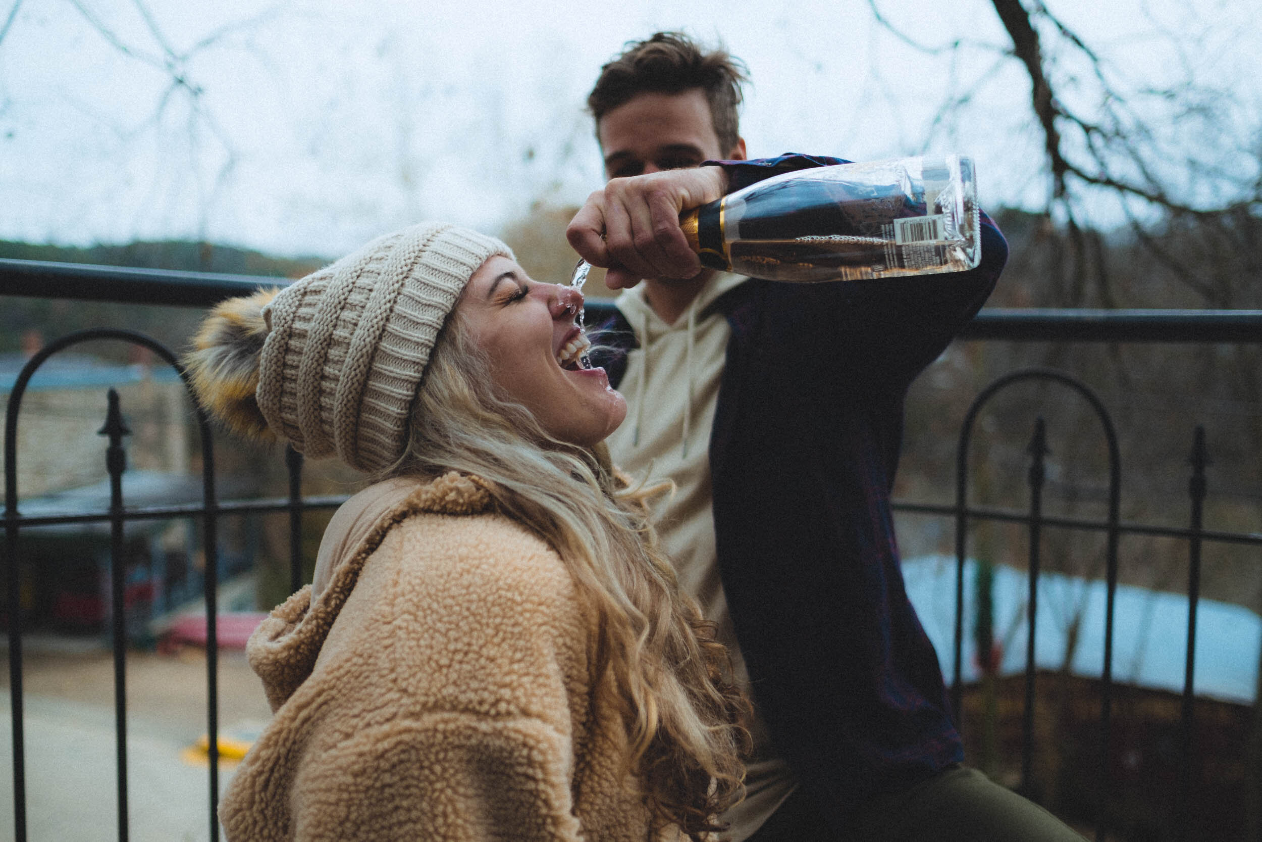 Failed Pinterest pose with champagne during engagement session