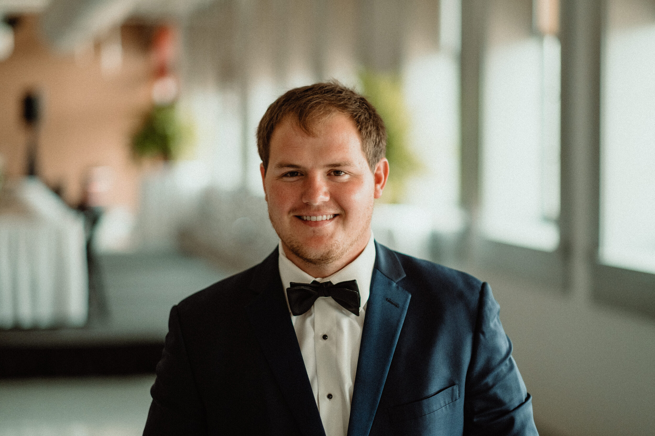 Groom portraits at DMACC Conference Center in Newton IA