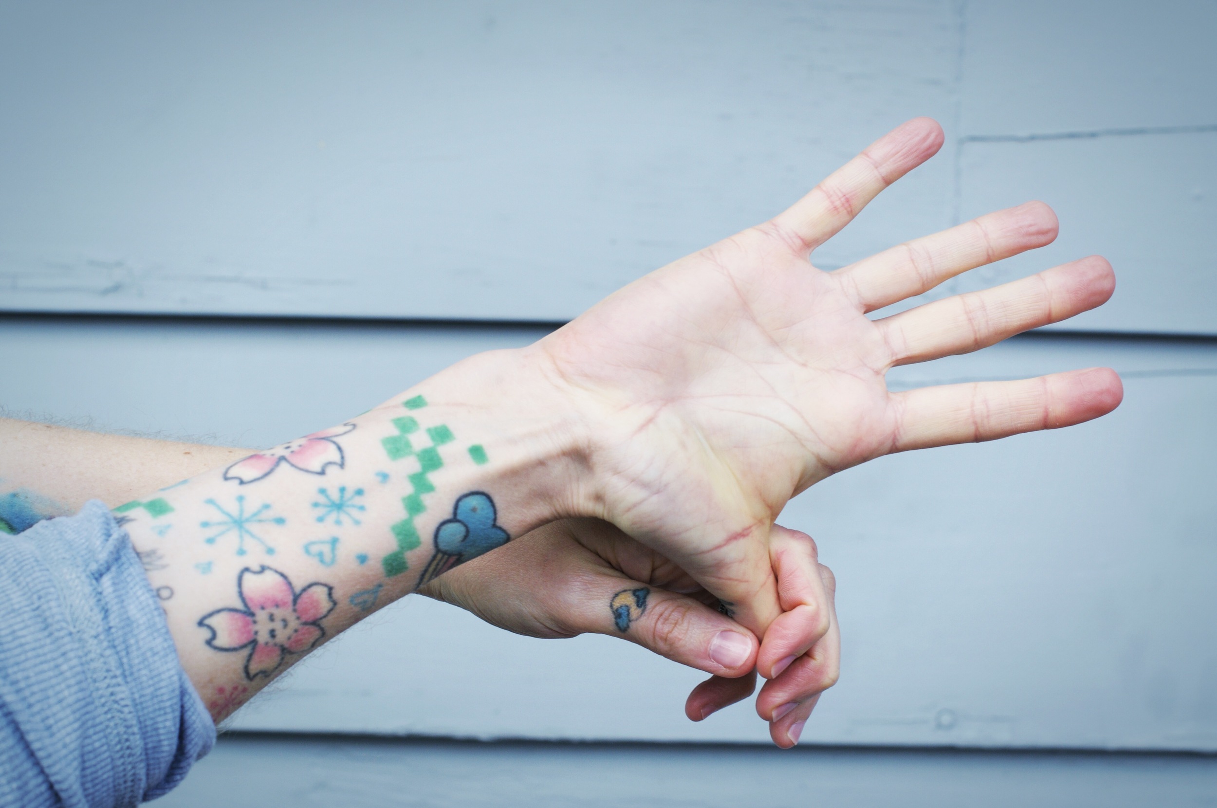 Thumbs! Mine seem to get the brunt of the work sometimes and can get really tight. In this stretch just hold your hand out with fingers spread and gently pull your thumb towards the back of your hand. Hold the stretch for 10 seconds and repeat with your other thumb.