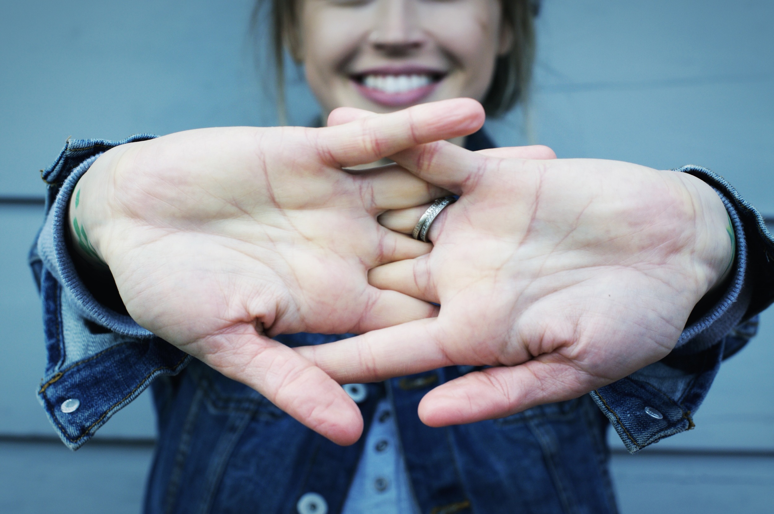 Lastly, a stretch I think we are all familiar with! Simply lock your fingers together, rotate palms facing out and push away from your body. Hold stretch for 15 seconds, repeat if desired.