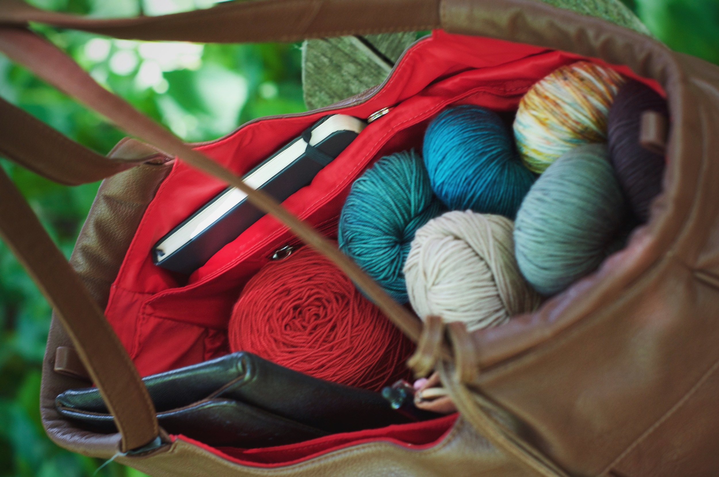 On those rare and wonderful occasions that I get to sneak off and knit sans babies ;), here she is, filled to the brim with my latest yarn haul, interchangeable needles, and sketchbook, inspiration sparked and ready to go!