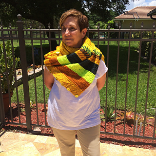 Anne's bright Om Shawl knit with Plucky is amazing!