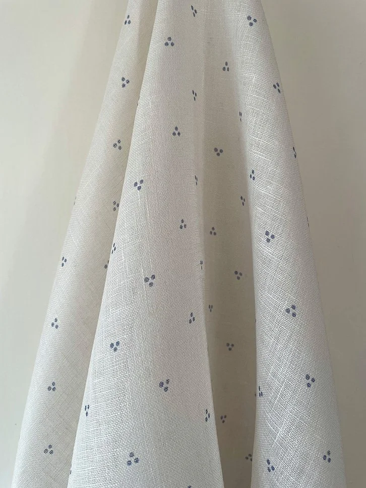 Petite Trio of Dots Faded Blue fabric draped, highlighting gentle flow and dot groupings.