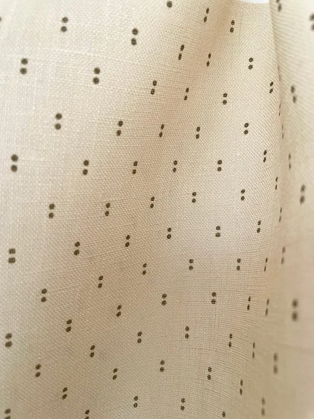Petite Pair of Dots khaki on butter yellow close-up, showing dot spacing and fabric surface.
