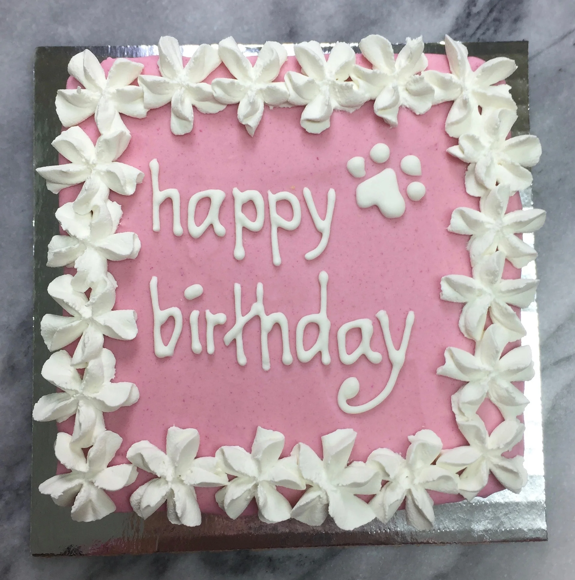 Pink with white frosting