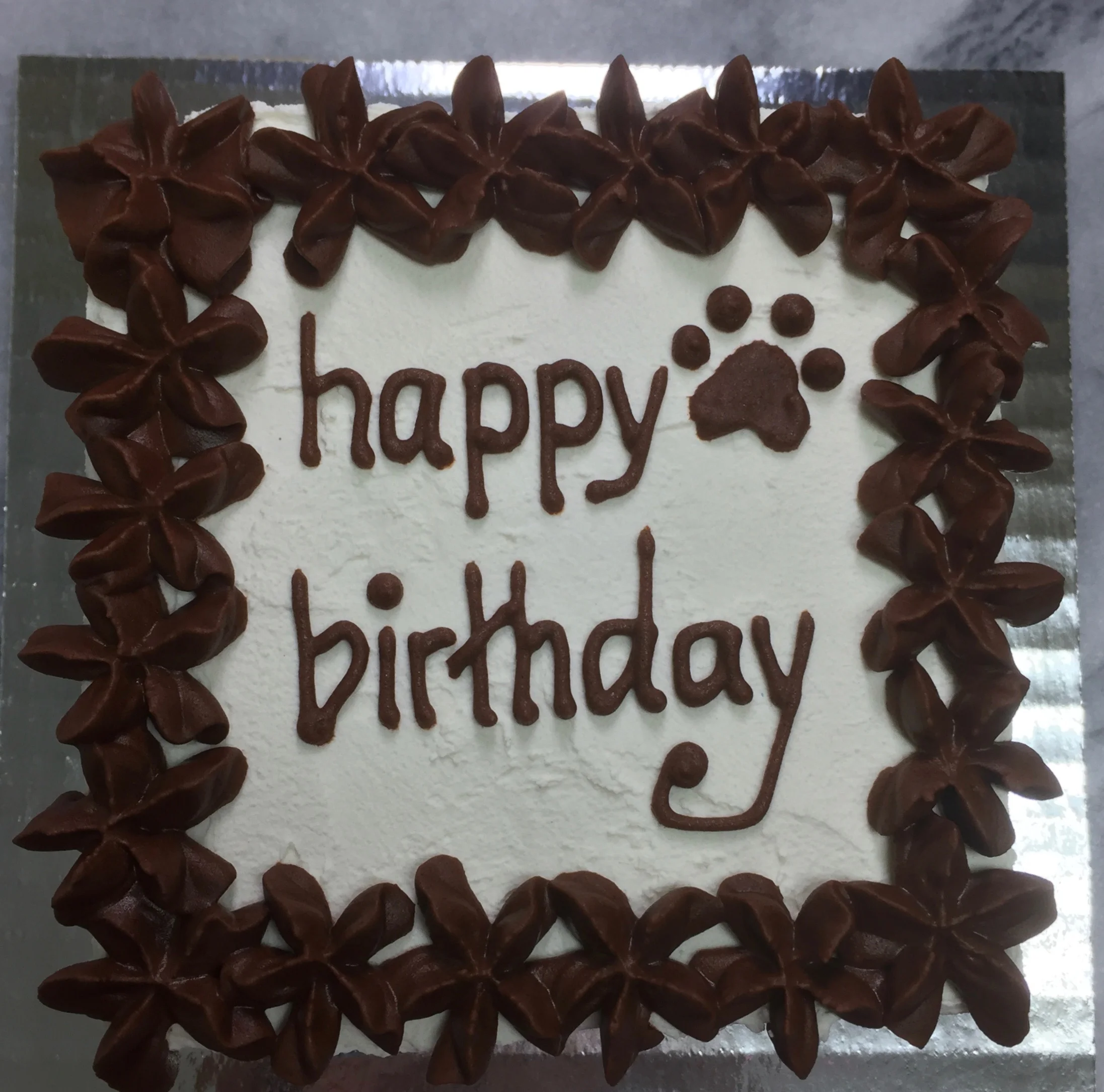 White with brown frosting