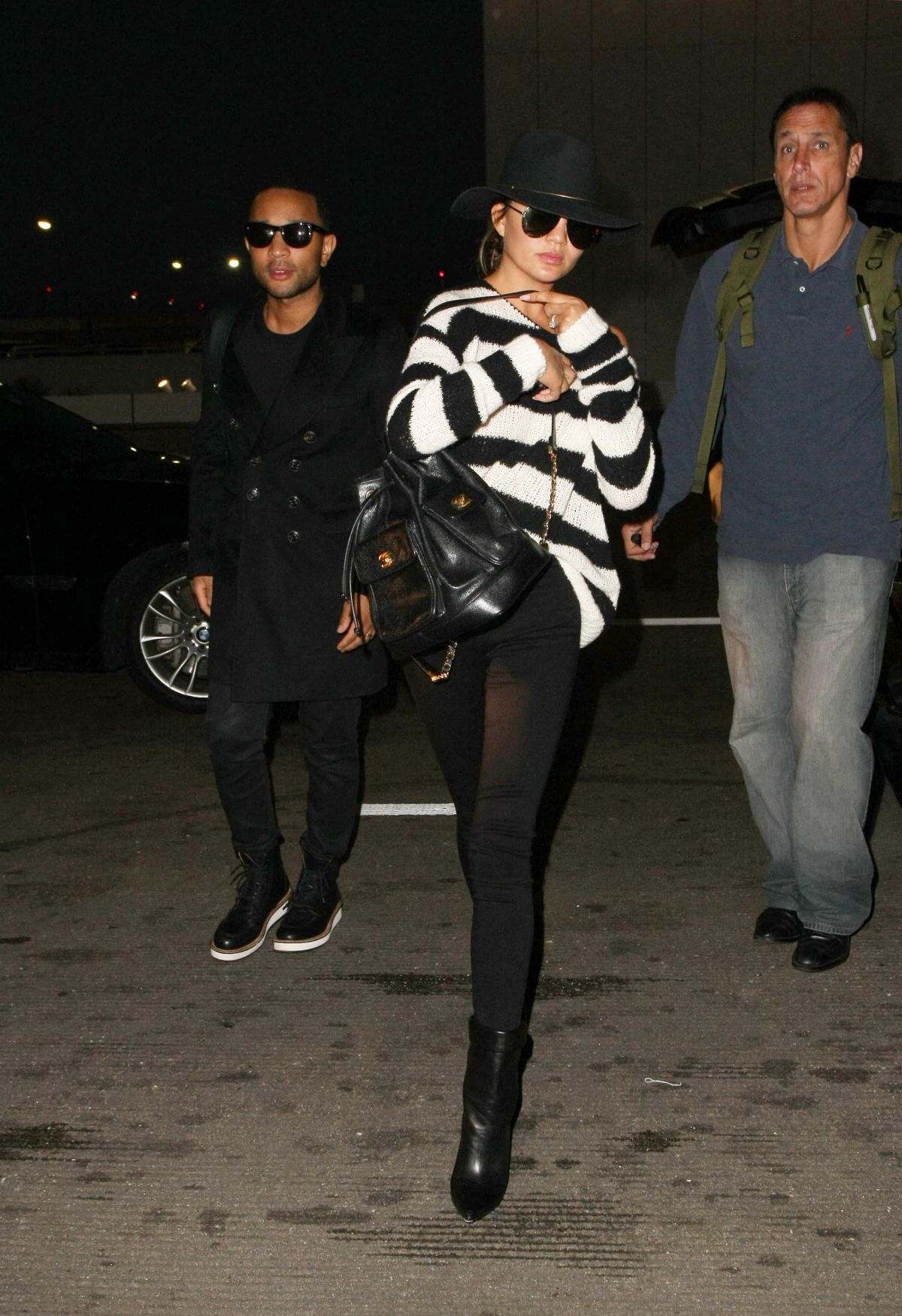 John Legend and Chrissy Teigen heading into LAX 01.05.17