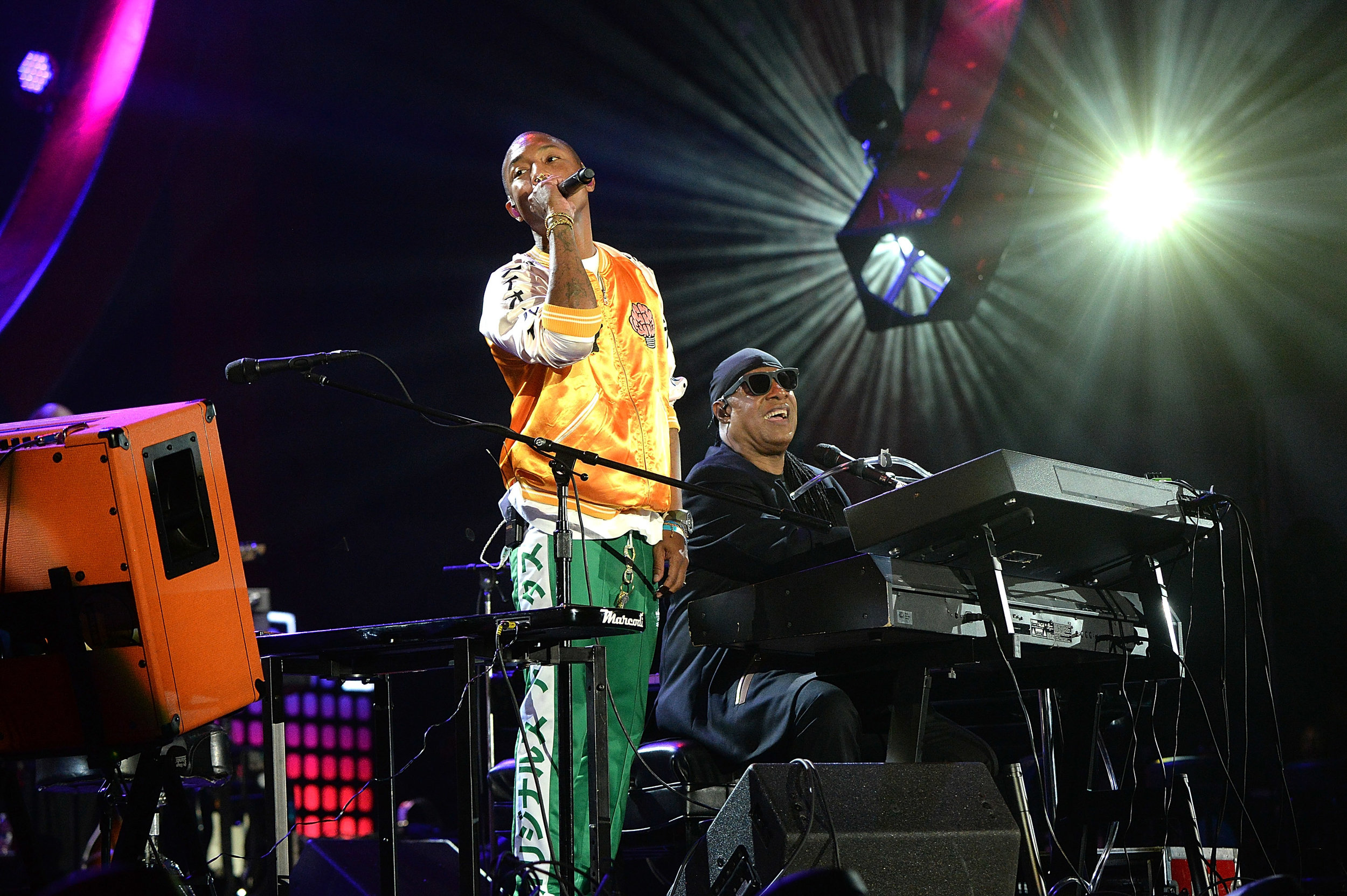 | PHOTOGRAPHY Kevin Mazur/Getty Images for Global Citizen) - Pharrell Williams; Stevie Wonder |