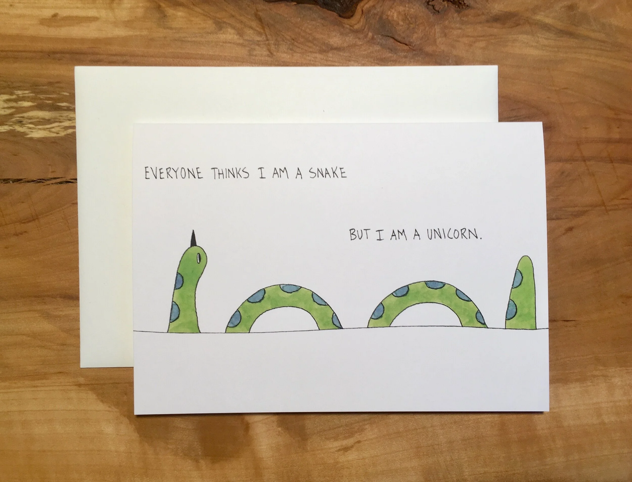 Snake:Unicorn_envelope_wood.jpg
