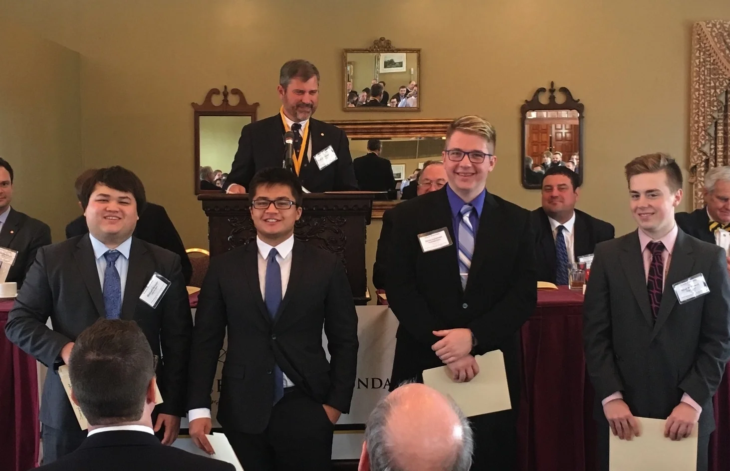 From left, Arizona State Treasurer Samuel Strayer, Arizona State Venerable Dean Jacob Strayer, Washington State Venerable Dean David Czyzewicz, and Oregon State Venerable Dean and undergraduate International Counselor Ryan McDowell (accepting scholarship in place of OSU members Justin Honda and Adrian Williams who were not in attendance) pose with Ling-Stout Scholarships in hand. 