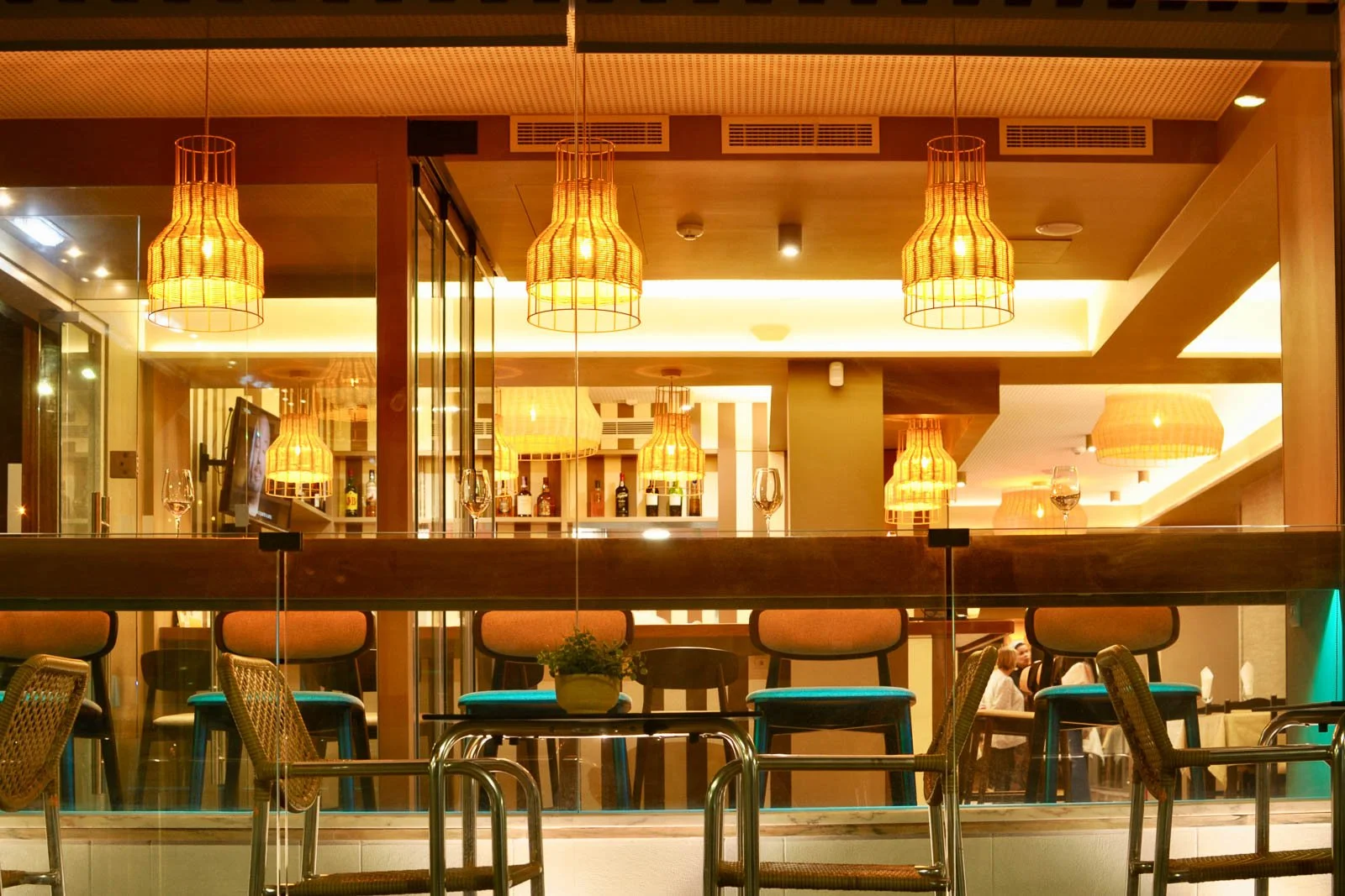 Custom Indian woven rattan ceiling lamps - restaurant night ambience