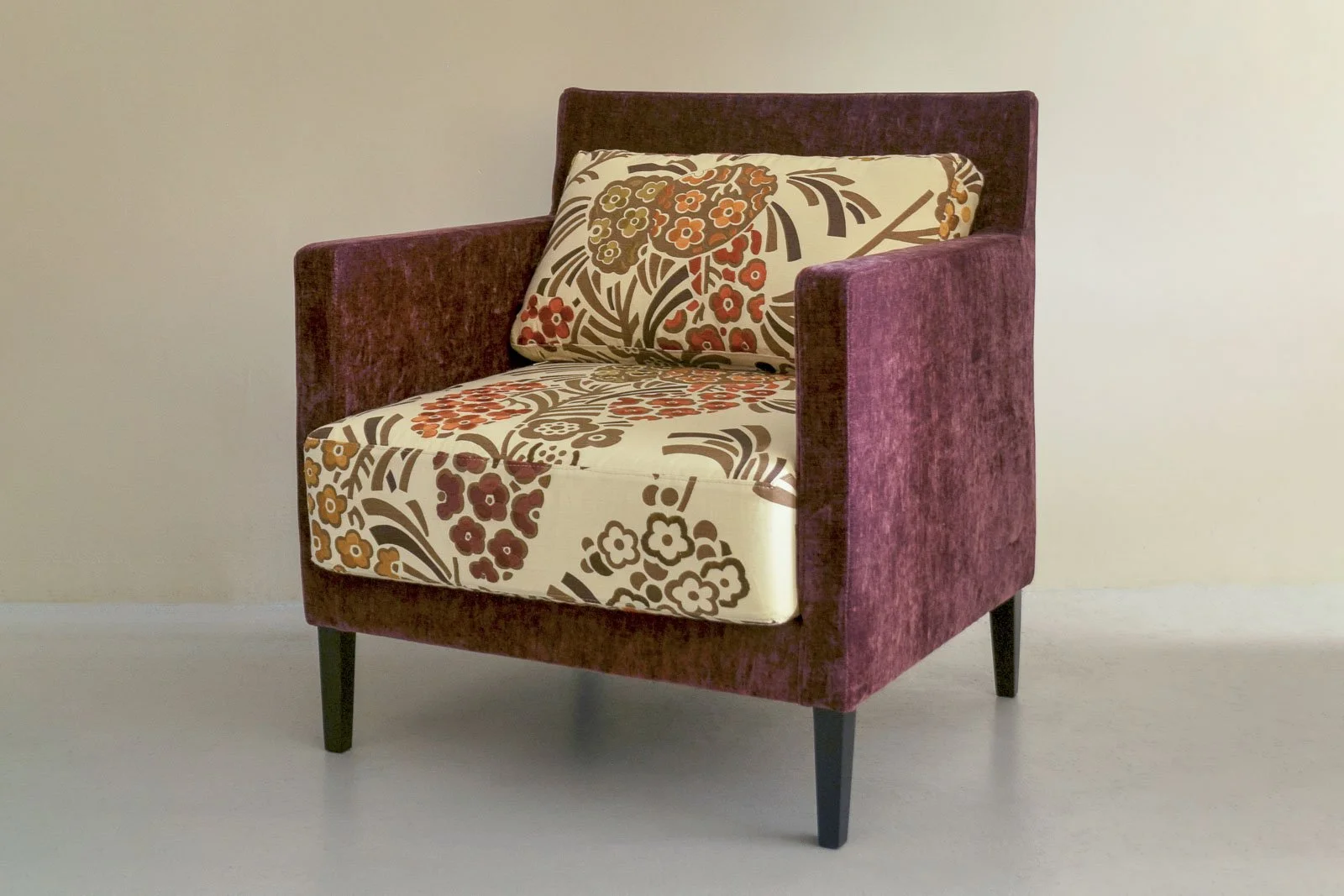 Purple velvet armchair with embroidered pattern upholstery