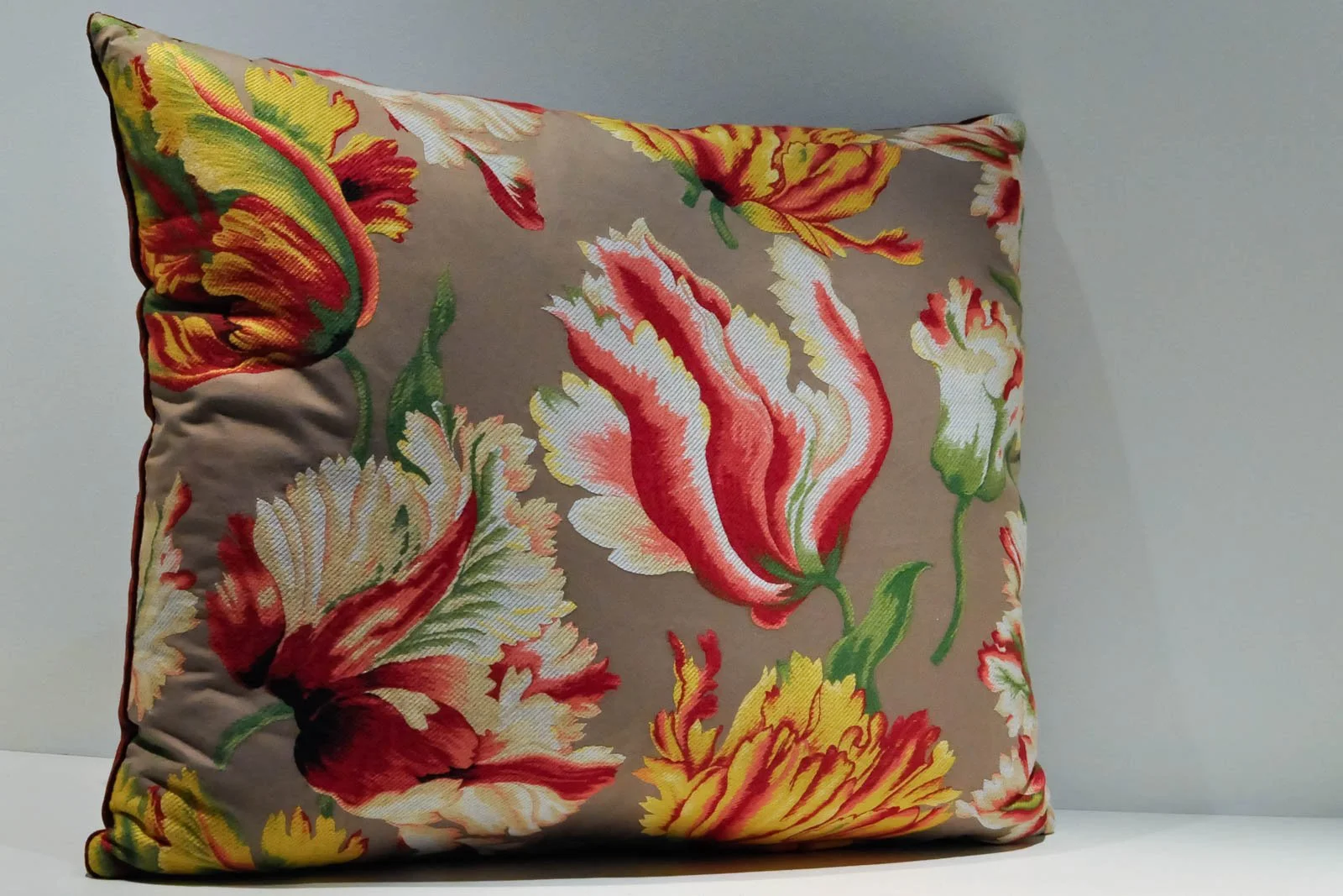 Pillow with embroidered flowers pattern