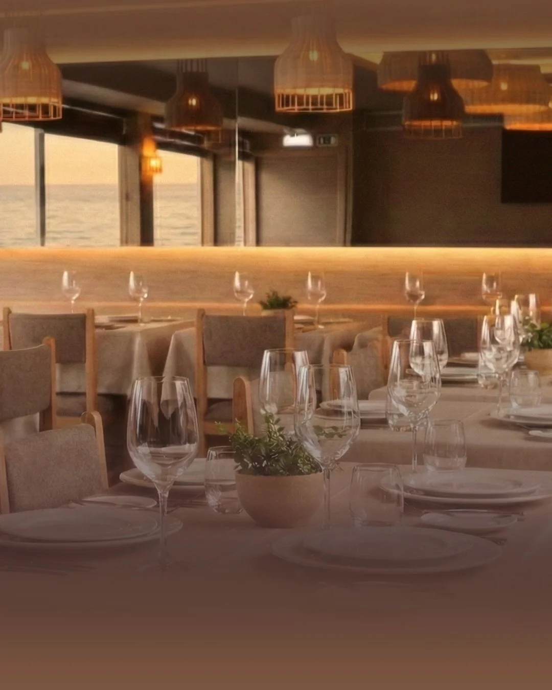 Every surface considered, every piece made. A hospitality project where bespoke furniture and wall meet in the same material language: grasscloth, woven rattan, wood drawn from the same palette as the land outside.

#interiordesign #restaurantdesign 