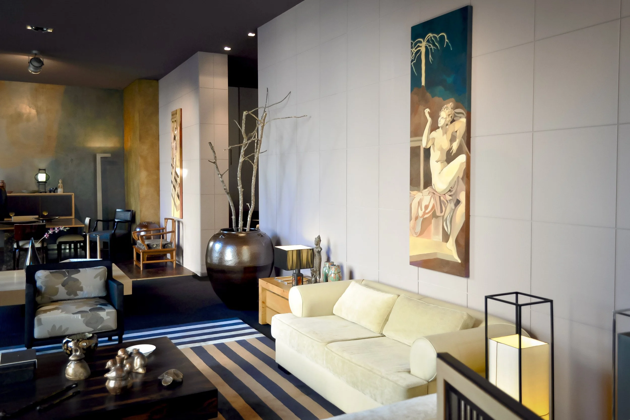 Modern living room at Jose Antonio Andrade’s Porto, Portugal, interior design studio with custom tapestry and upholstery.