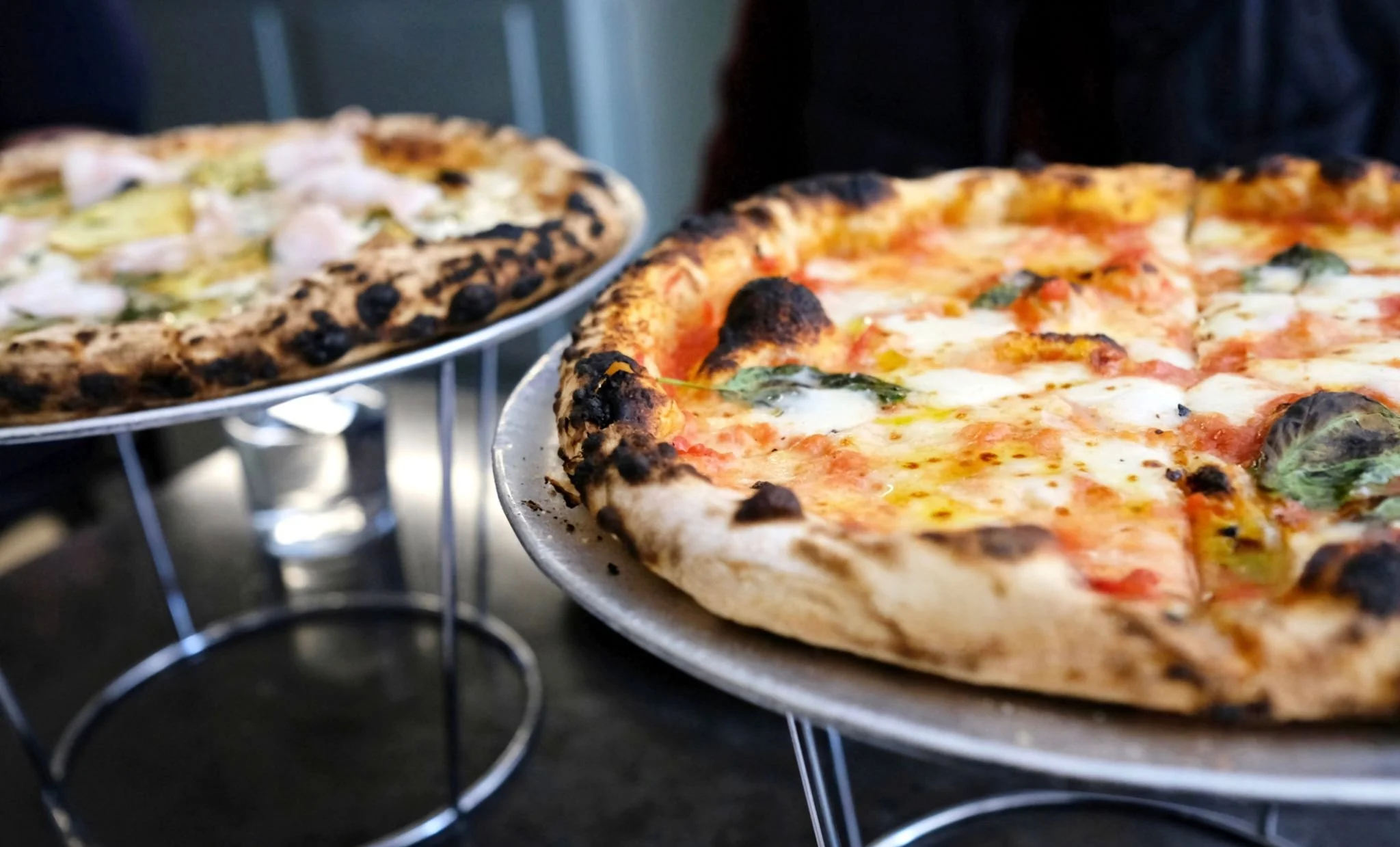 woodfire pizzas on stand.jpg