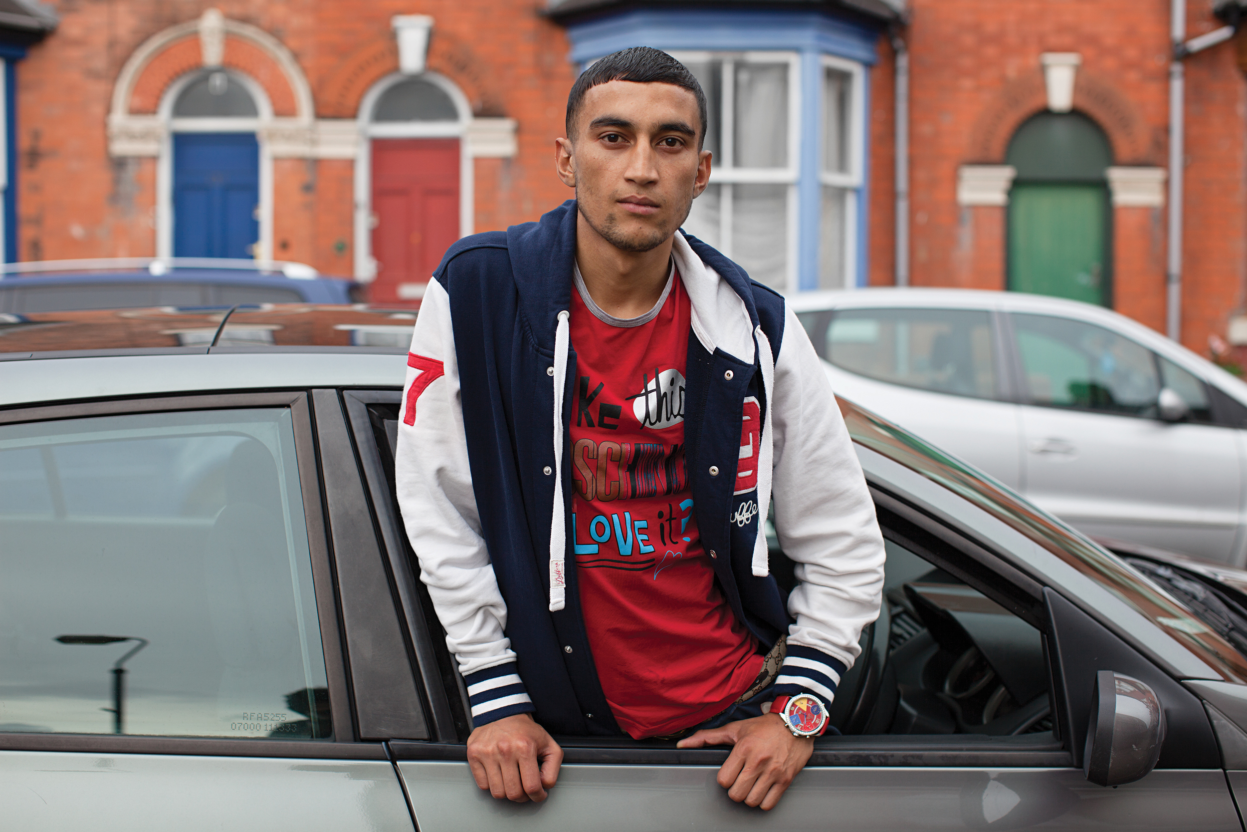 Red T-Shirt, baseball jacket, car © Mahtab Hussain - You Get Me?.jpg