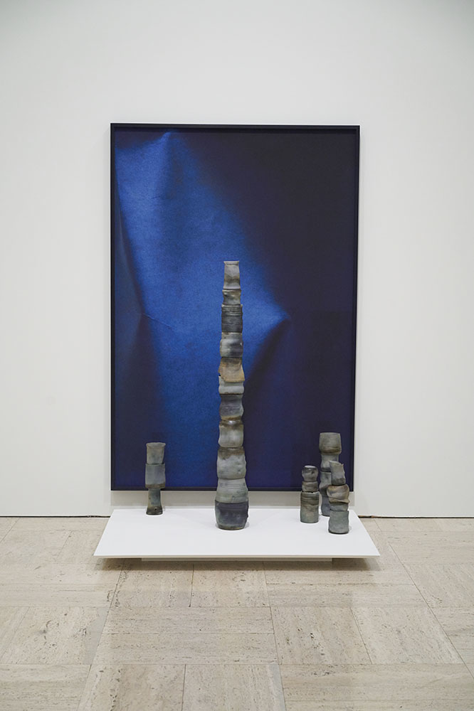 Unfixed, Fold No. 3, archival pigment print , in artist frame with unfixed cyanotype emulsion, 60x41in Unfixed, Cairn No. 1, porcelain dipped in unfixed cyanotype emulsion, dimensions variable