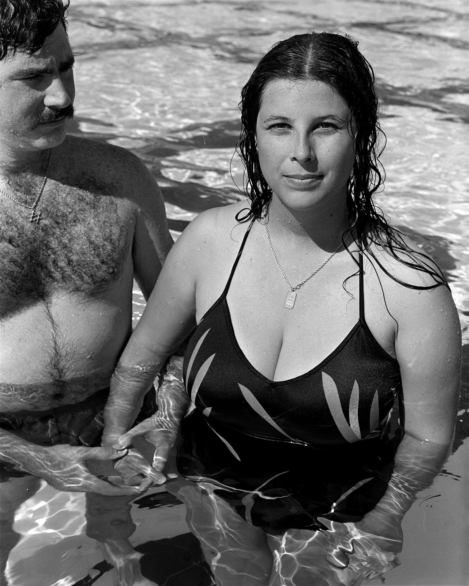   Woman with husband, JCC pool, 1981  