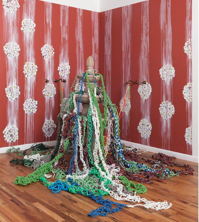 "The Intrepid Garden II," 2018, painted sweet asylum flowers, crocheted rope, fountain, dimensions variable