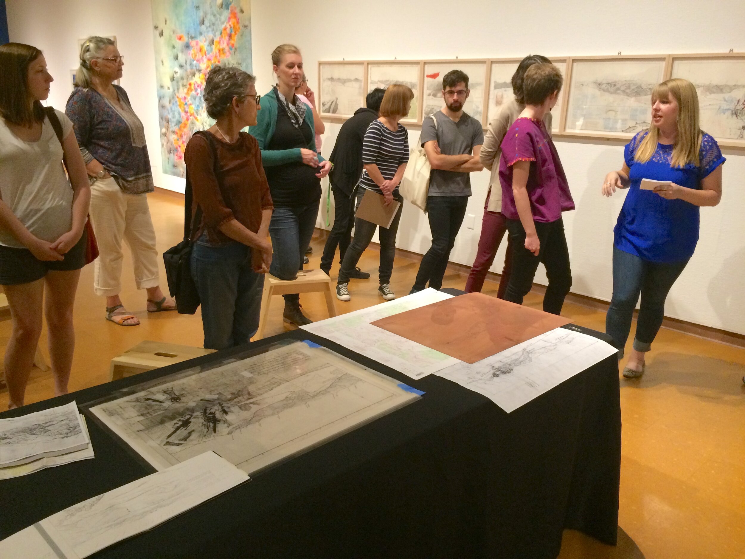 Artist Katelyn Bladel leading a printmaking demo and conversation.