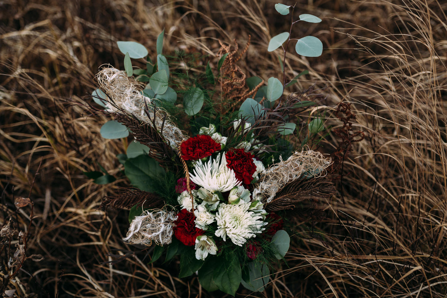 Paper peony flowers with dried fireweed