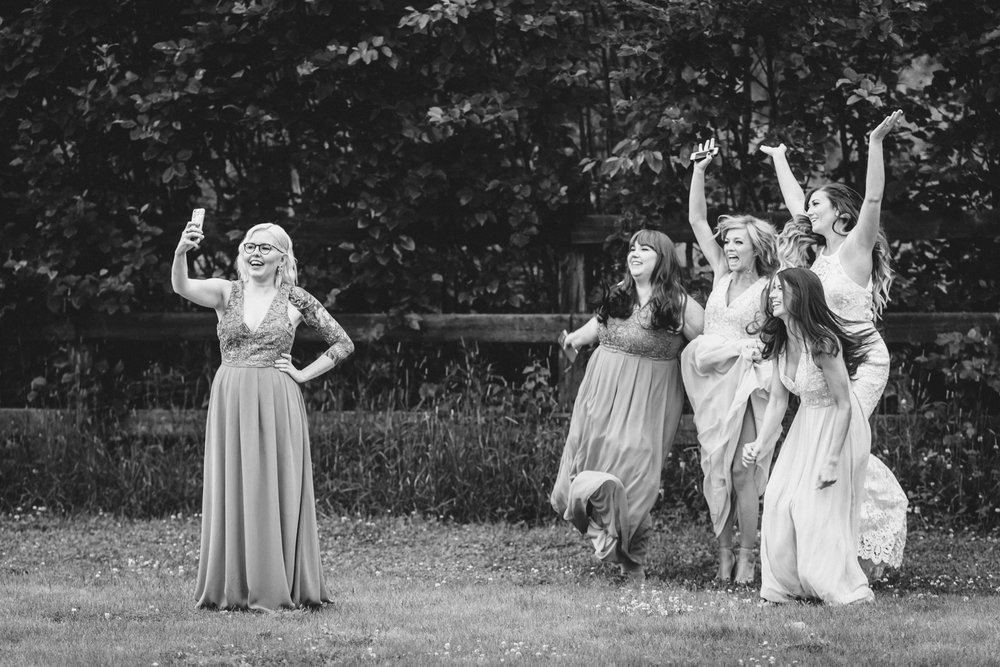 Alaskan bridesmaids posing for a jump photo