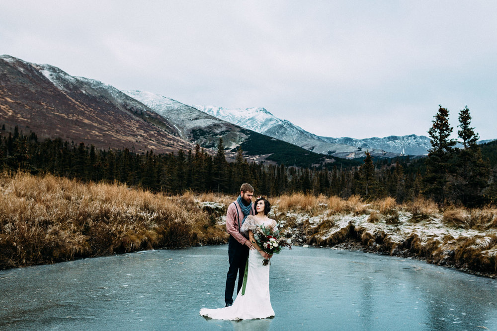 Couple on frozen lake in Bear Valley