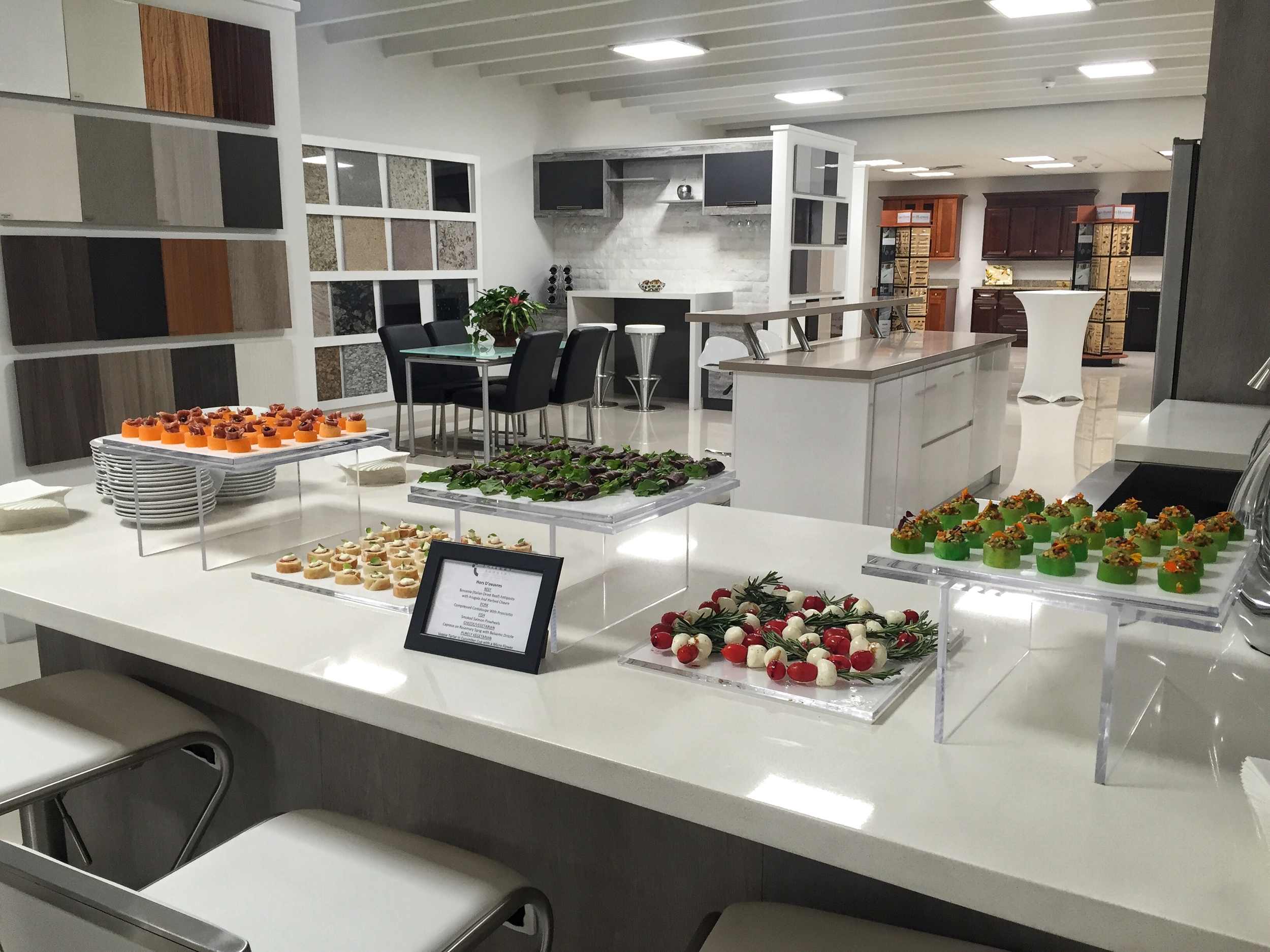 Chic, contemporary spread for grand opening of 35,000 square foot offices, warehouse and state-of-the-art showroom of leading wholesale building materials supplier in Doral. Doral's mayor, Luigi Boria, was in attendance for the ribbon cutting ceremony.