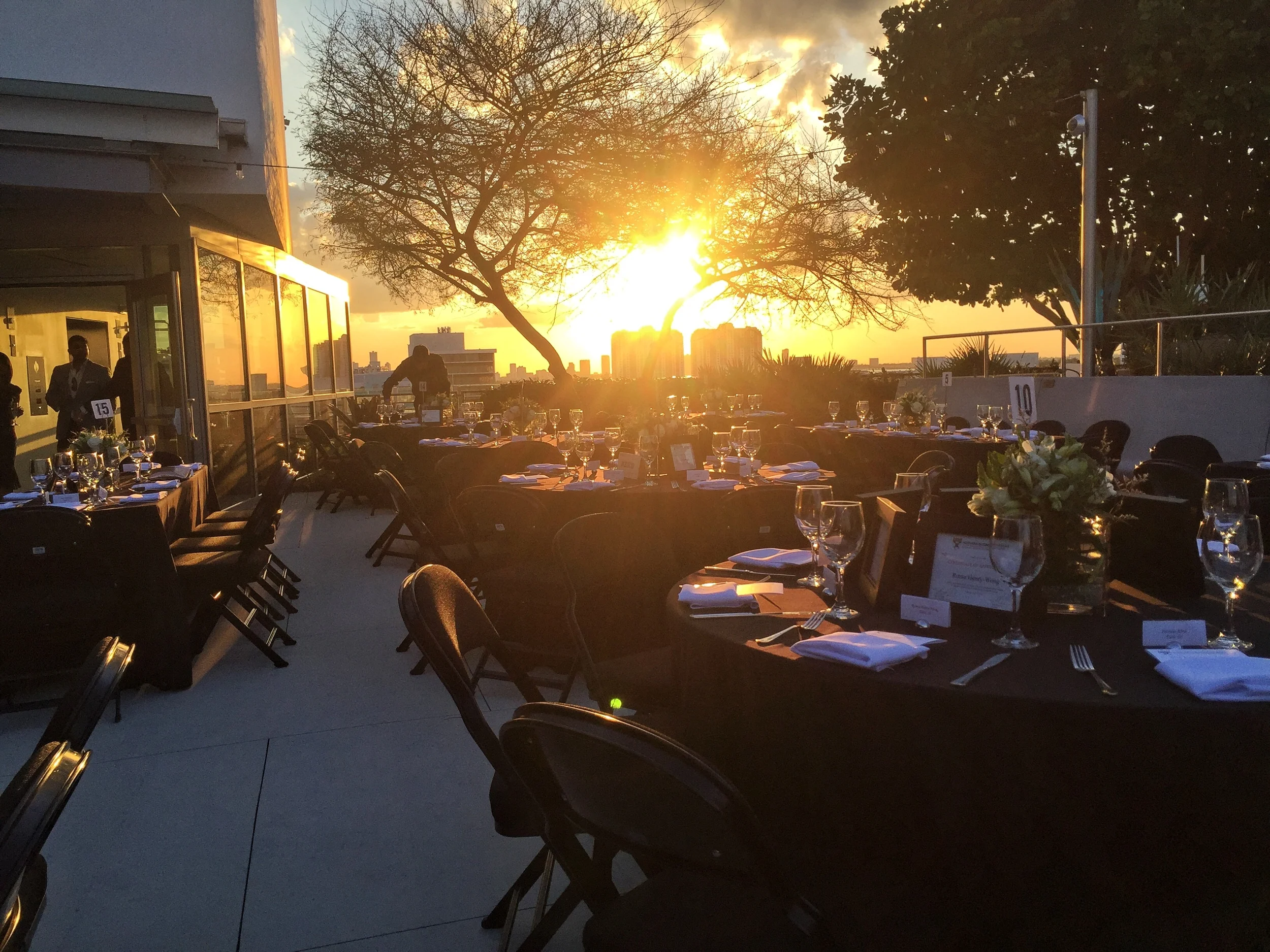 Setting up for dinner on the Rooftop Garden