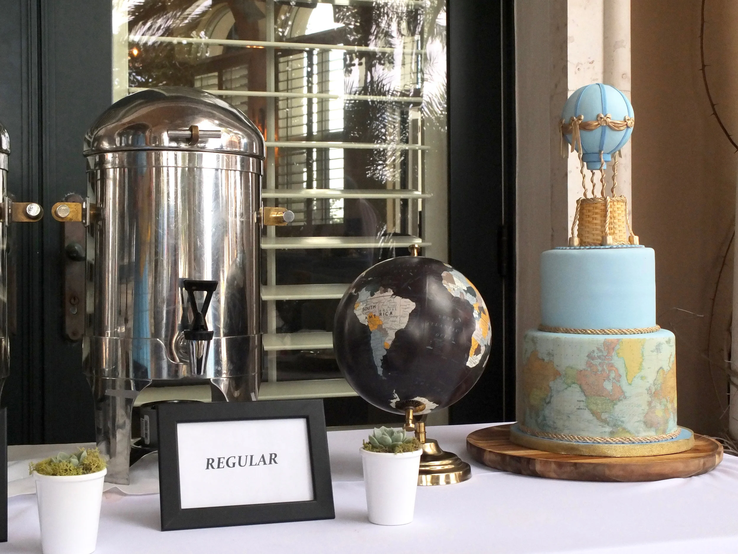 Spectacular custom-made vegan cake, designed to fit the theme & color scheme.